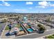 Aerial view showing home's location, neighborhood, and nearby pools at 1344 E Ellis Cir, Mesa, AZ 85203