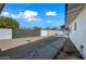 Pathway to a fenced pool and backyard at 1344 E Ellis Cir, Mesa, AZ 85203