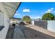 Landscaped backyard with walkway and gate at 1344 E Ellis Cir, Mesa, AZ 85203