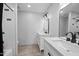Modern bathroom with double vanity and updated fixtures at 1344 E Ellis Cir, Mesa, AZ 85203