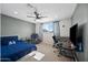 Bedroom with a desk setup and ceiling fan at 1344 E Ellis Cir, Mesa, AZ 85203