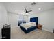 Spacious bedroom with a large window and plush bed at 1344 E Ellis Cir, Mesa, AZ 85203