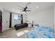 Bedroom with twin beds and updated flooring at 1344 E Ellis Cir, Mesa, AZ 85203