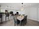 Modern dining area with marble-top table and six chairs at 1344 E Ellis Cir, Mesa, AZ 85203