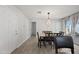Clean and bright entryway with modern light fixture at 1344 E Ellis Cir, Mesa, AZ 85203