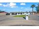 Updated single-story home with a landscaped front yard and driveway at 1344 E Ellis Cir, Mesa, AZ 85203