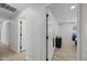 Clean and spacious hallway with neutral color palette at 1344 E Ellis Cir, Mesa, AZ 85203