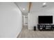 Clean and bright hallway with wood-look flooring at 1344 E Ellis Cir, Mesa, AZ 85203