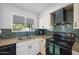 Updated kitchen with granite counters and stainless steel appliances at 1344 E Ellis Cir, Mesa, AZ 85203