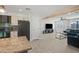 Open concept kitchen with granite countertops and breakfast bar at 1344 E Ellis Cir, Mesa, AZ 85203
