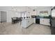 Open concept kitchen with island and granite countertops at 1344 E Ellis Cir, Mesa, AZ 85203