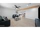 Open concept living room with a view into the kitchen at 1344 E Ellis Cir, Mesa, AZ 85203