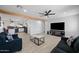 Open concept living area with kitchen and fireplace views at 1344 E Ellis Cir, Mesa, AZ 85203