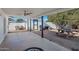 Covered patio with picnic table and citrus tree at 1344 E Ellis Cir, Mesa, AZ 85203