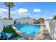 Inviting kidney-shaped pool with ample patio space at 1344 E Ellis Cir, Mesa, AZ 85203
