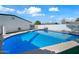Refreshing blue pool surrounded by a spacious backyard at 1344 E Ellis Cir, Mesa, AZ 85203