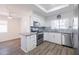 Modern kitchen with stainless steel appliances and gray countertops at 1515 W Glenn Dr, Phoenix, AZ 85021