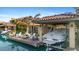 Covered boat dock with seating area and lake views at 1530 W Commerce Ave, Gilbert, AZ 85233