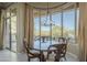 Cozy dining area with large windows offering scenic views, chandelier, and wood table at 15836 E Brittlebush Ln, Fountain Hills, AZ 85268