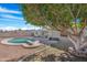 Inviting backyard with swimming pool and patio cover at 1710 E 1St St, Mesa, AZ 85203