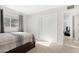 Bedroom with a double bed and sliding door closet at 1710 E 1St St, Mesa, AZ 85203