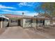 Light green single story home with a covered carport at 1710 E 1St St, Mesa, AZ 85203