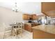 Eat-in kitchen boasts granite counters and stainless steel appliances at 1710 E 1St St, Mesa, AZ 85203