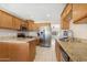 Kitchen with granite countertops and stainless steel appliances at 1710 E 1St St, Mesa, AZ 85203