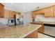 Granite countertop kitchen with stainless steel appliances at 1710 E 1St St, Mesa, AZ 85203
