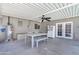 Covered patio with table, chairs, and ceiling fan at 1710 E 1St St, Mesa, AZ 85203