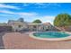Home with a refreshing backyard pool and patio area at 1710 E 1St St, Mesa, AZ 85203