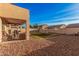 Spacious backyard with artificial turf and patio at 18147 W Desert View Ln, Goodyear, AZ 85338
