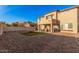 Private backyard oasis with patio and artificial grass at 18147 W Desert View Ln, Goodyear, AZ 85338