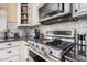 Modern kitchen with stainless steel appliances and granite countertops at 18147 W Desert View Ln, Goodyear, AZ 85338