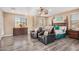 Large main bedroom with two armchairs and ensuite bathroom access at 18147 W Desert View Ln, Goodyear, AZ 85338