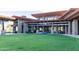 Community welcome center with stone facade and seating area at 18147 W Desert View Ln, Goodyear, AZ 85338