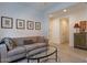 Spacious living room with a tufted sofa and glass coffee table at 18219 E Coronado Cave Ct, Rio Verde, AZ 85263