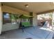 Covered patio with seating area and grill at 18239 N Cook Dr, Maricopa, AZ 85138