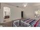 Comfortable bedroom with ensuite bathroom and plenty of natural light at 18239 N Cook Dr, Maricopa, AZ 85138