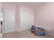 bedroom with a closet and plenty of space for toys at 18239 N Cook Dr, Maricopa, AZ 85138