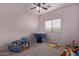 bedroom with playful decor and ample closet space at 18239 N Cook Dr, Maricopa, AZ 85138