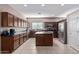 Bright kitchen with an island, stainless steel appliances, and lots of storage at 18239 N Cook Dr, Maricopa, AZ 85138