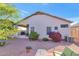 Private backyard with patio, grill and mature shrubs at 20632 N 103Rd Ave, Peoria, AZ 85382