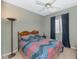 Bright bedroom with window and ceiling fan at 20632 N 103Rd Ave, Peoria, AZ 85382