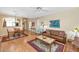 Open concept dining area with wood floors and a chandelier at 20632 N 103Rd Ave, Peoria, AZ 85382