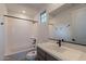 Clean bathroom with a bathtub, vanity, and mirror at 21259 E Sparrow Dr, Queen Creek, AZ 85142