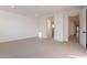 Spacious bedroom with carpet flooring and access to bathroom at 21259 E Sparrow Dr, Queen Creek, AZ 85142
