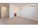Bright bedroom with carpet and view to bathroom at 21259 E Sparrow Dr, Queen Creek, AZ 85142