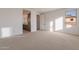 Bedroom with carpet flooring and large window with natural light at 21259 E Sparrow Dr, Queen Creek, AZ 85142