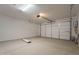 Spacious garage with overhead door and extra space at 21259 E Sparrow Dr, Queen Creek, AZ 85142